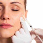 A licensed aesthetic practitioner performing a precise Botox treatment in Coral Gables