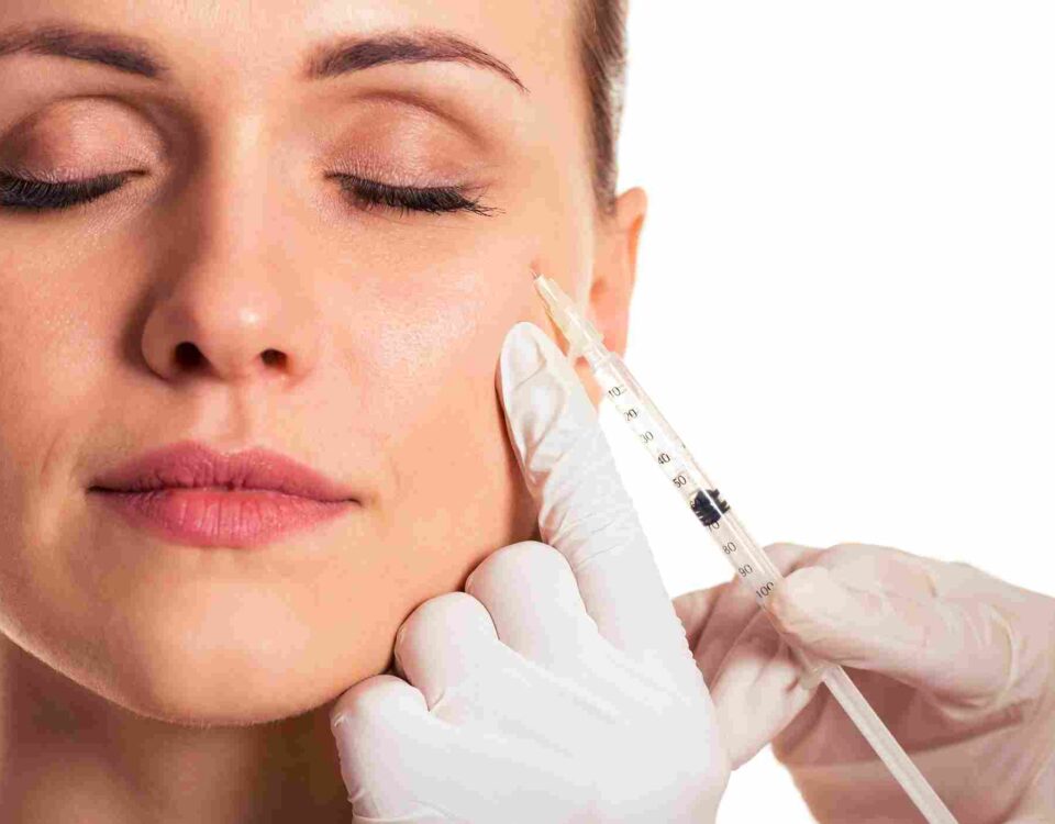 A licensed aesthetic practitioner performing a precise Botox treatment in Coral Gables