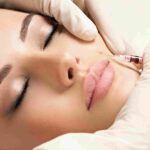 : A medical provider conducting a comprehensive facial evaluation for Botox in Coral Gables.
