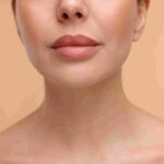 A clinical hyaluronic acid lip filler consultation at Pōk Aesthetic Bar in Coral Gables.