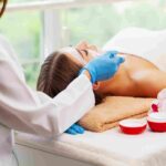 Boutique treatment room inside Pōk Aesthetic Bar medical spa in Coral Gables.