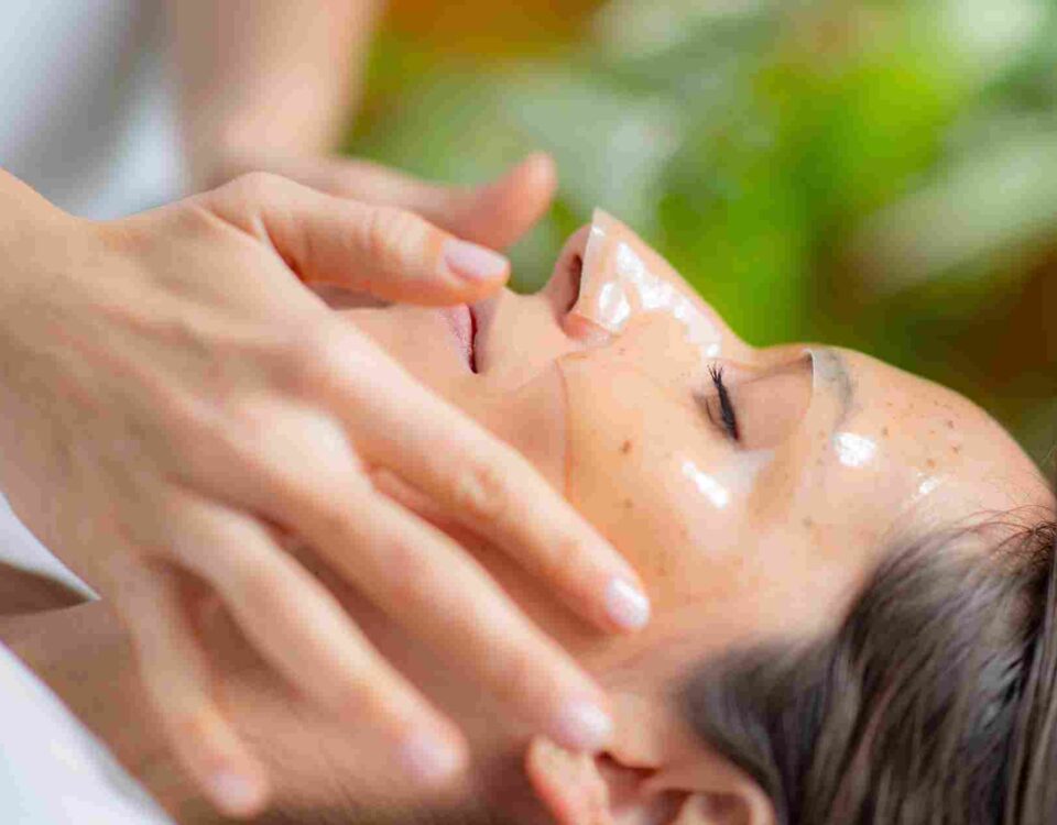 Client receiving a relaxing professional facial treatment at a boutique aesthetic clinic in Coral Gables.