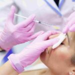 Licensed medical professional performing Botox injections at a boutique medical aesthetics clinic in Coral Gables.