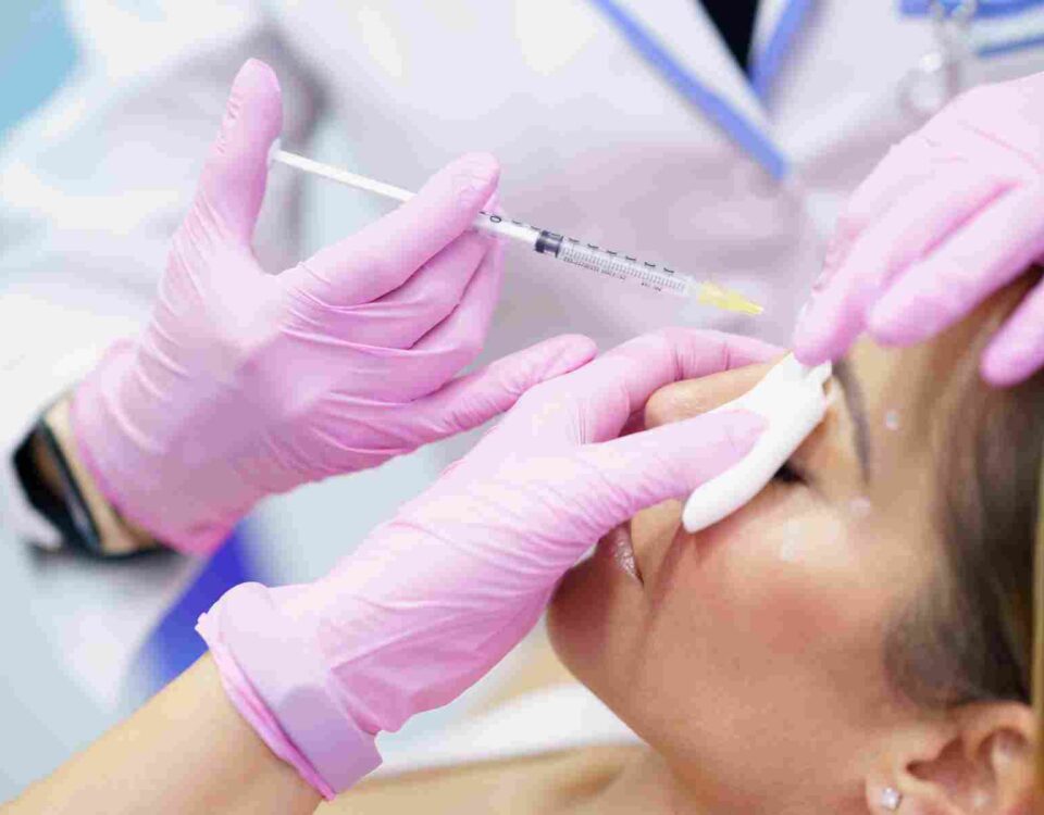 Licensed medical professional performing Botox injections at a boutique medical aesthetics clinic in Coral Gables.